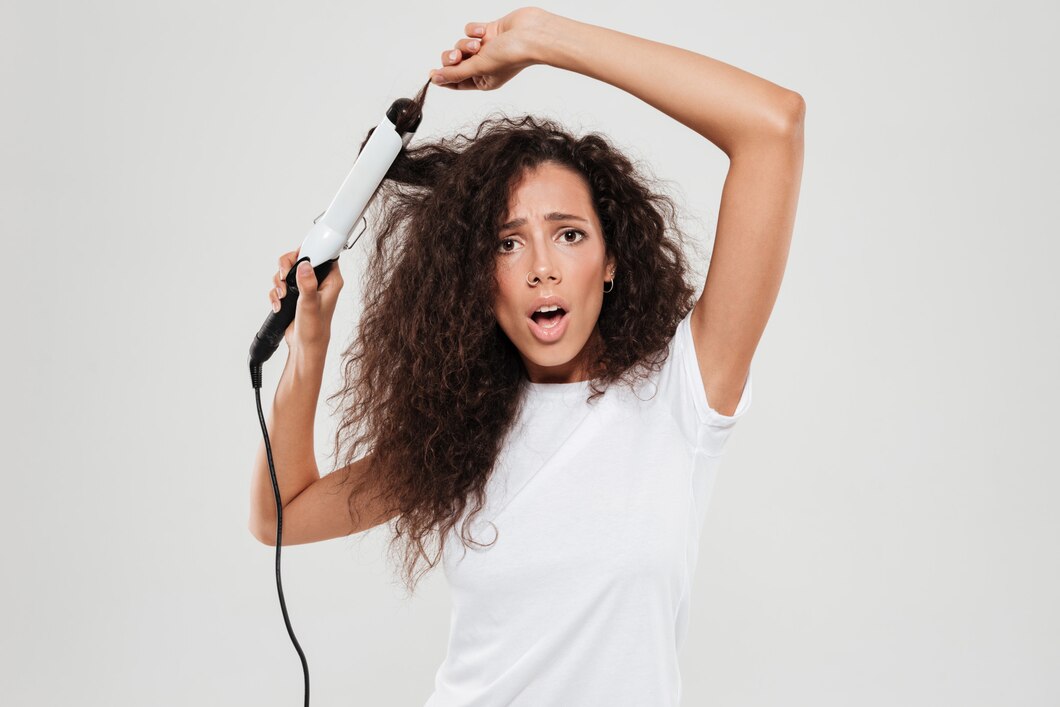 How does heat damage hair, and what are the best solutions for prevention and treatment?